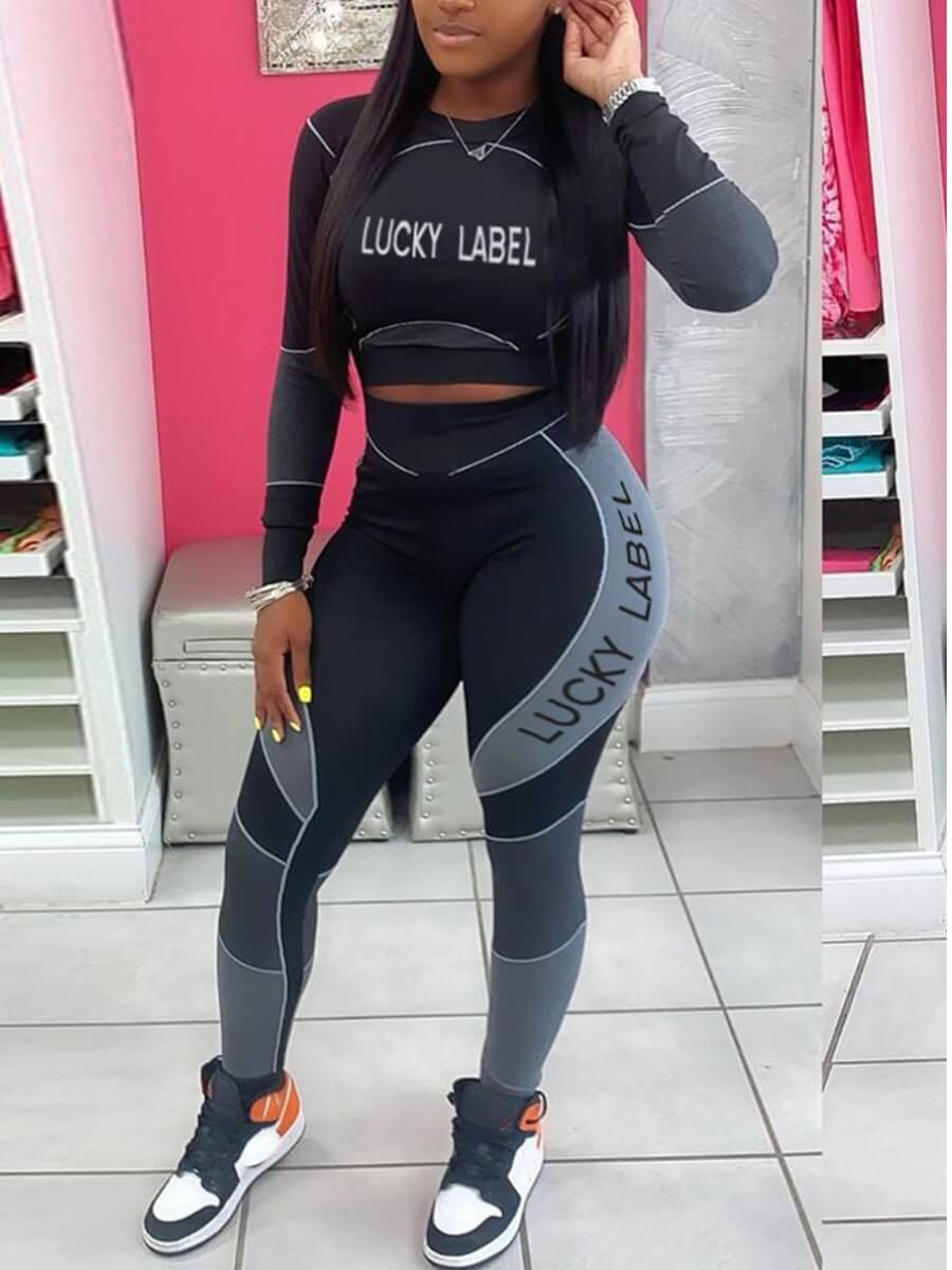 

Lovely Sportswear Letter Print Patchwork Black Two Piece Pants Set